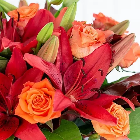 Autumnal Splendor: Lilies and Roses